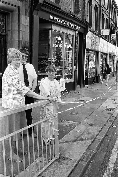 Smithdown Road shopkeepers Mrs Anne Lev (right) and Mrs Elsie Luxton and her son