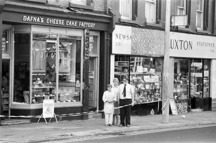 Framed Print : Smithdown Road shopkeepers Mrs Anne Lev (right) and Mrs Elsie Luxton and her son Framed Print : Smithdown Road shopkeepers Mrs Anne Lev (right) and Mrs Elsie Luxton and her son