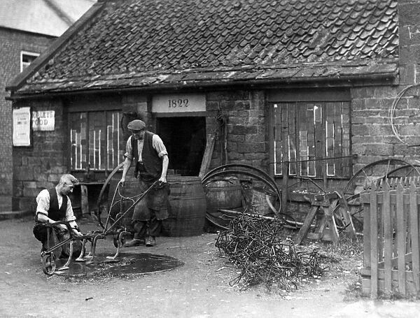 The Smithy at Ponteland - a typically rural scene. This forge bears the date 1822
