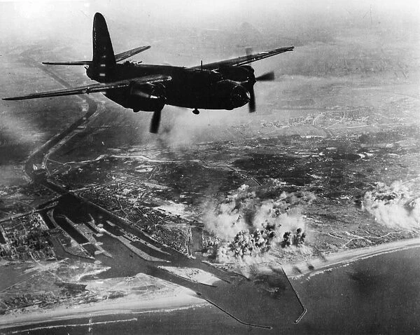 The smoke clears after an avalanche of bombs aimed at the Nazi E boat pens at Ijmuiden