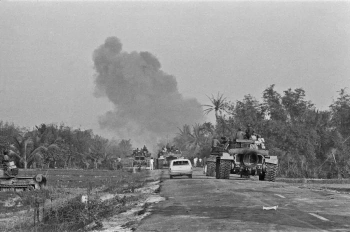 Framed Print : Smoke rising in the distance as armoured units of the South Vietnamese army shell Viet Framed Print : Smoke rising in the distance as armoured units of the South Vietnamese army shell Viet