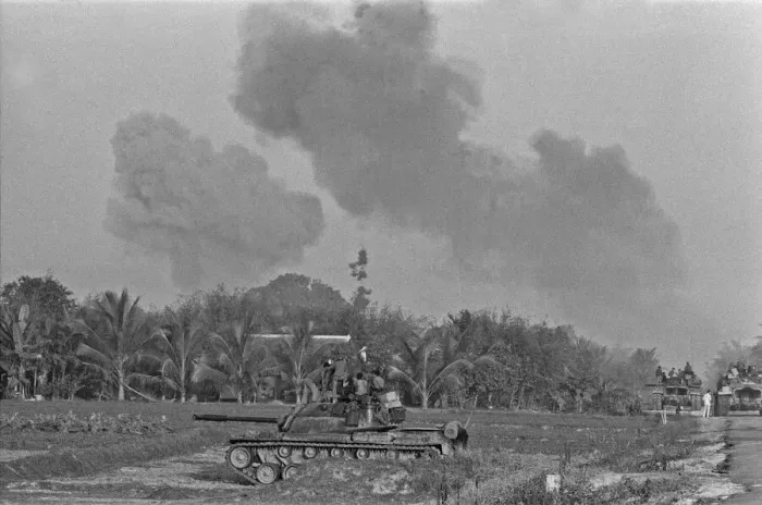 Framed Print : Smoke rising in the distance as armoured units of the South Vietnamese army shell Viet Framed Print : Smoke rising in the distance as armoured units of the South Vietnamese army shell Viet