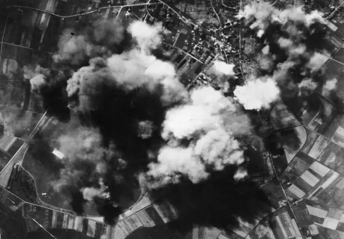 Framed Print : Smoke spouts up from the Nazi repair and equipment aerodrome at Werl, east of Dortmund Framed Print : Smoke spouts up from the Nazi repair and equipment aerodrome at Werl, east of Dortmund