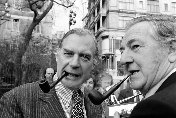 Smoking Pipes: Mr. Campbell Adamson with actor Rupert Davies. January 1975 75-00425-001