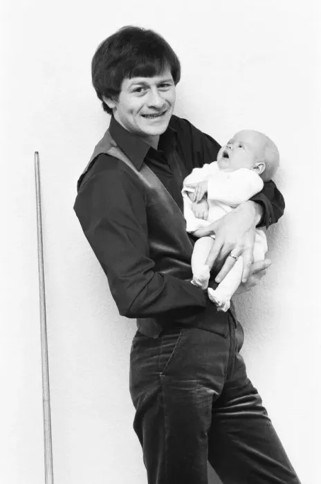 Framed Print : Snooker player Alex Hurricane Higgins with his baby daughter Lauren Framed Print : Snooker player Alex Hurricane Higgins with his baby daughter Lauren