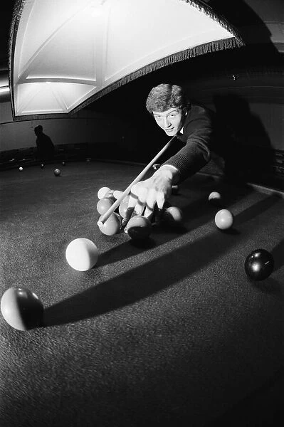 Snooker player Steve Davis practising for his next big match. 12h December 1980