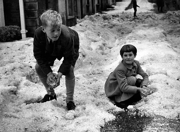 'Snowballs'of hailstones brought fun for these children in Castle Street