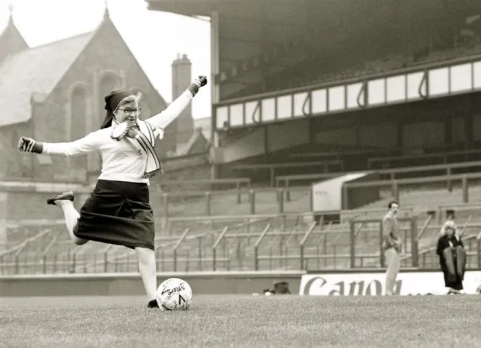 Framed Print : Soccer Sister - Nun kicking football shooting at goal Goodison Park Everton Framed Print : Soccer Sister - Nun kicking football shooting at goal Goodison Park Everton
