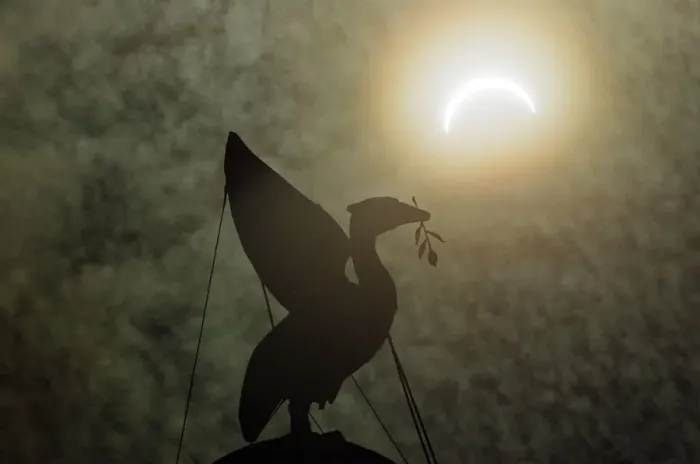 Framed Print : The solar eclipse pictured behind the Silhouette of the Liver Bird on a tower of Framed Print : The solar eclipse pictured behind the Silhouette of the Liver Bird on a tower of