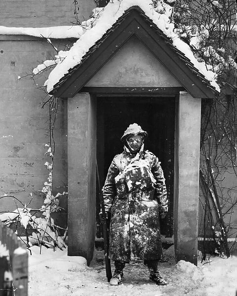 Soldier on sentry duty during a snow storm somewhere in Kent during the Second World War