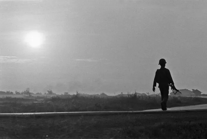 Framed Print : A soldier of the South Vietnamese army advances on Viet Cong positions in Trang Bang just Framed Print : A soldier of the South Vietnamese army advances on Viet Cong positions in Trang Bang just