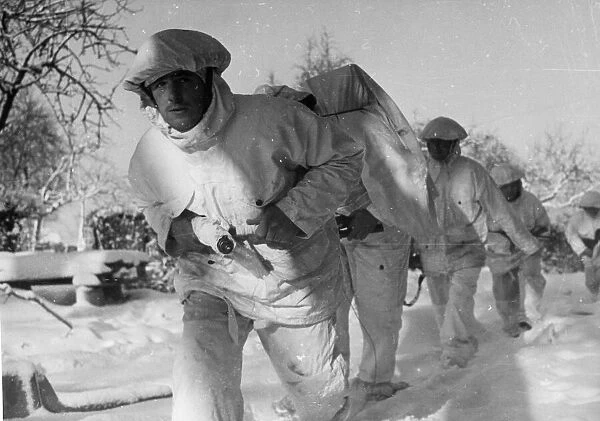 Soldiers of the 1st Battalion Glasgow Highlanders seen here in their snow camouflage