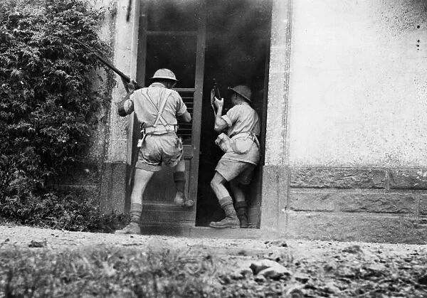 Soldiers of the British Eighth Army take control of a town in Sicily following the Allied