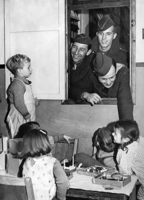 Framed Print : Soldiers with children in a nursery during World war two November 1942 Framed Print : Soldiers with children in a nursery during World war two November 1942