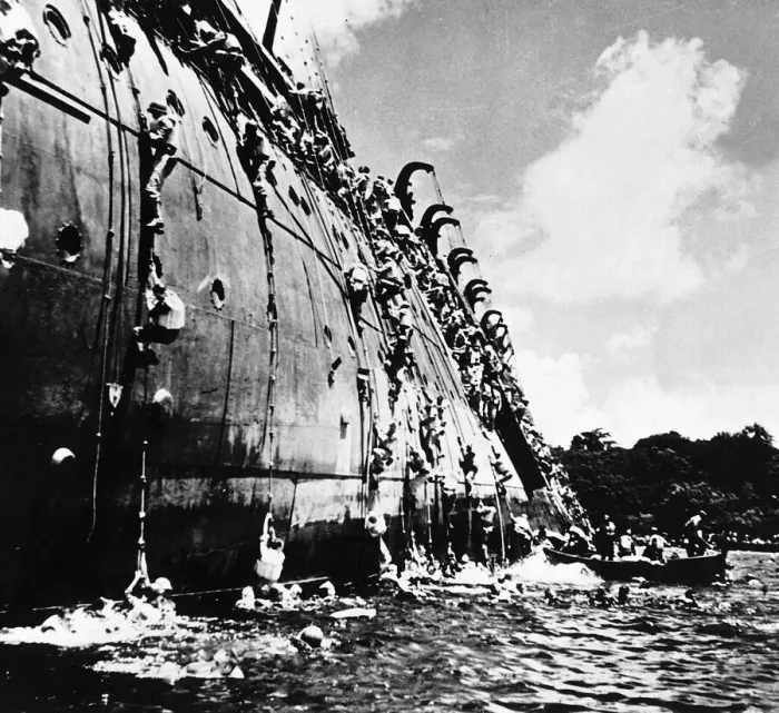 Framed Print : Soldiers and crew abandon SS Coolidge after it hit a mine Framed Print : Soldiers and crew abandon SS Coolidge after it hit a mine