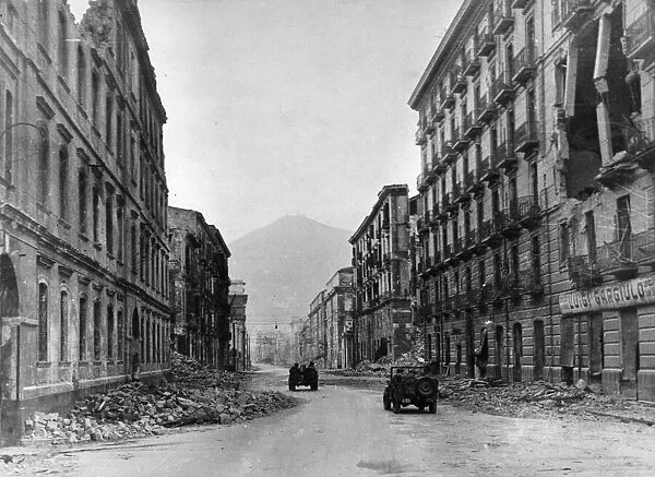 US soldiers drive jeeps through the deserted streets of Salerno, Italy