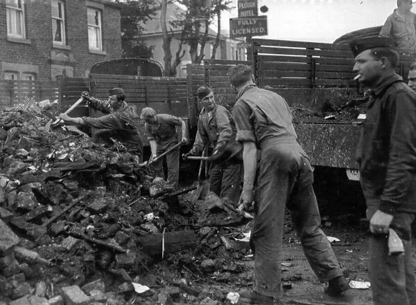 US Soldiers help to clean up the wreckage of the school at Freckleton, Lancashire