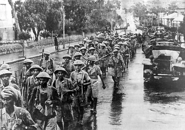 Soldiers from an Indian Infantry Brigade, march through Asmara
