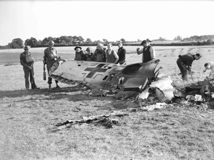 Framed Print : Soldiers, Policemen and local farmers inspect the wing of a German Messerschmitt BF109E Framed Print : Soldiers, Policemen and local farmers inspect the wing of a German Messerschmitt BF109E