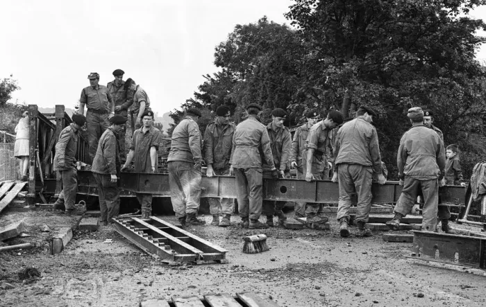 Framed Print : Soldiers of The Royal Engineers build bridges to help local residents after heavy floods Framed Print : Soldiers of The Royal Engineers build bridges to help local residents after heavy floods