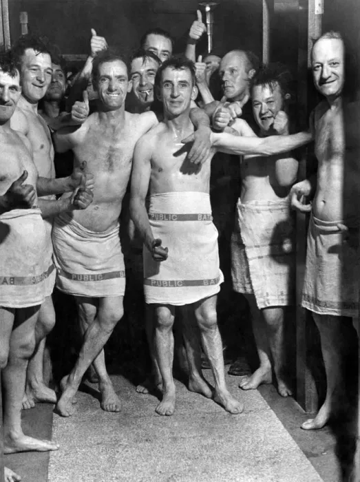 Framed Print : Soldiers from the Royal Pioneer Corps men enjoy a bath after labouring on air raid Framed Print : Soldiers from the Royal Pioneer Corps men enjoy a bath after labouring on air raid