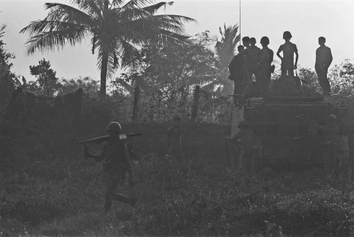 Framed Print : Soldiers of the South Vietnamese army watch from the top of an armoured personnel carrier