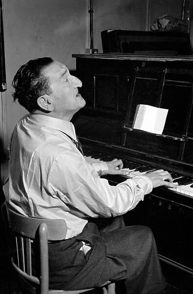 Song writer Harry Leon seen here playing piano. May 1953 D2367-005