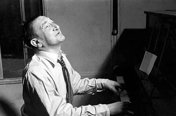 Song writer Harry Leon seen here playing piano. May 1953 D2367