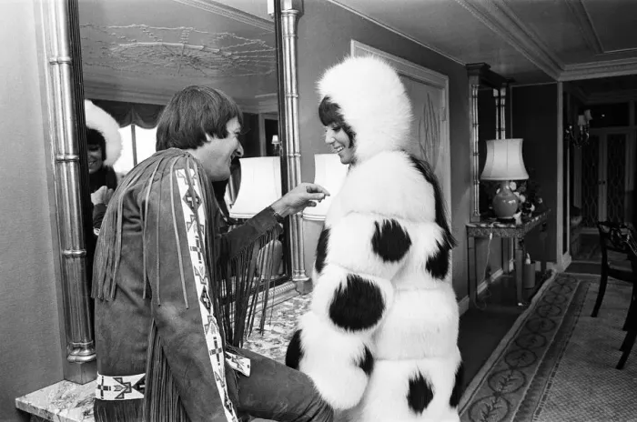 Framed Print : Sonny Bono & Cher, American music duo, pictured in their rooms at the Royal Garden Hotel Framed Print : Sonny Bono & Cher, American music duo, pictured in their rooms at the Royal Garden Hotel
