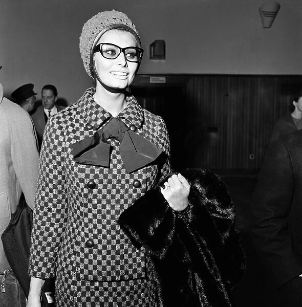 Sophia Loren arrives at London Airport from Italy to attend the Gala World Premier of