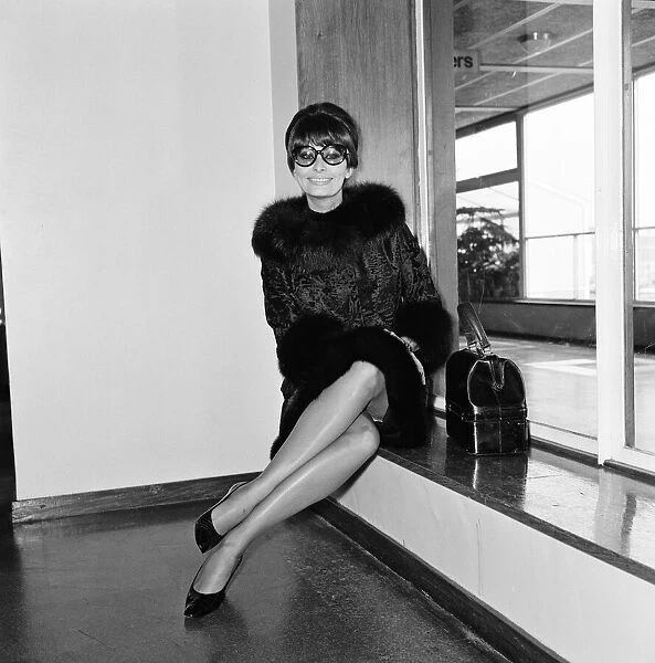 Sophia Loren at London Airport leaving for a weekend in Paris