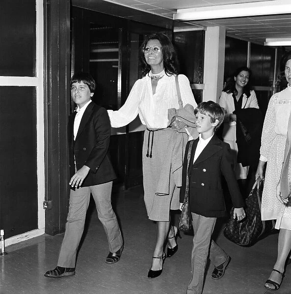 Sophia Loren and her sons Carlo Ponti, Jr. and Edoardo Ponti at London Airport