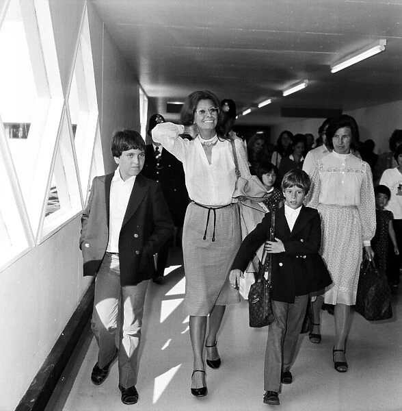 Sophia Loren and her sons Carlo Ponti, Jr. and Edoardo Ponti at London Airport