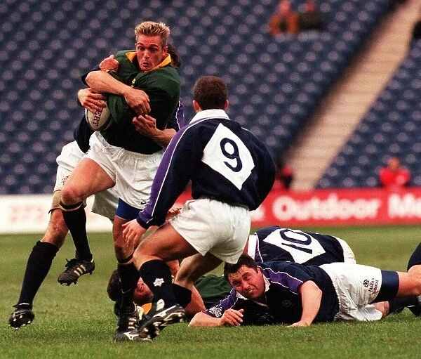 South African Full Back Percy Montgomery November 1998 Is Stopped By Scots Defence