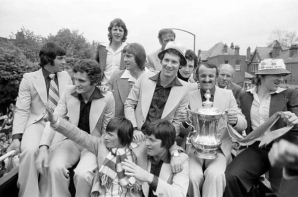 Southampton FC, FA Cup Winners 1976. Players celebrate win with fans during parade