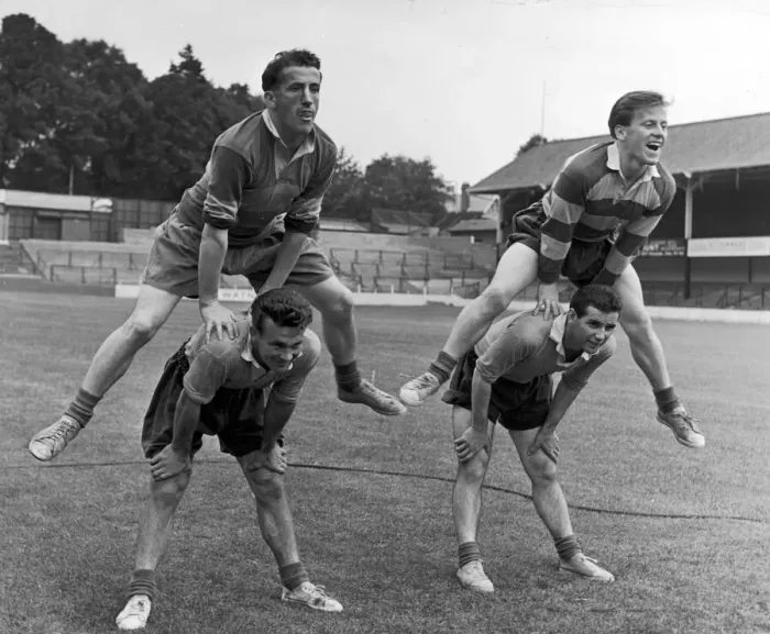 Framed Print : Southampton FC Players Leap frogging are from L2R Bending, Cliff Huxford and Dick Connor