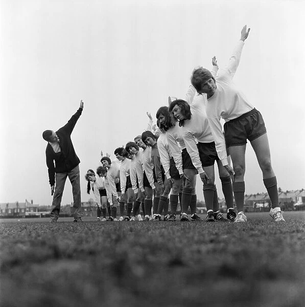 Southampton Ladies Football Club limber up with their manager Mr Norman Holloway