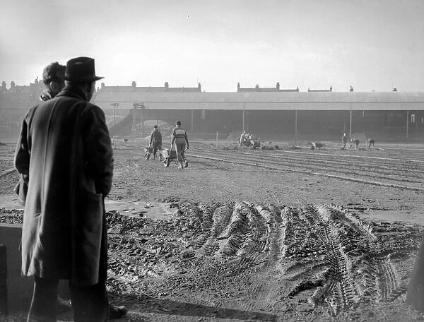 Southend ground staff prepare the pitch before the FA Cup tie match against Manchester