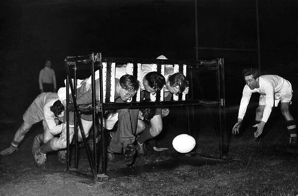 Southport Rugby League team practice with scrum machine. 6th February 1951