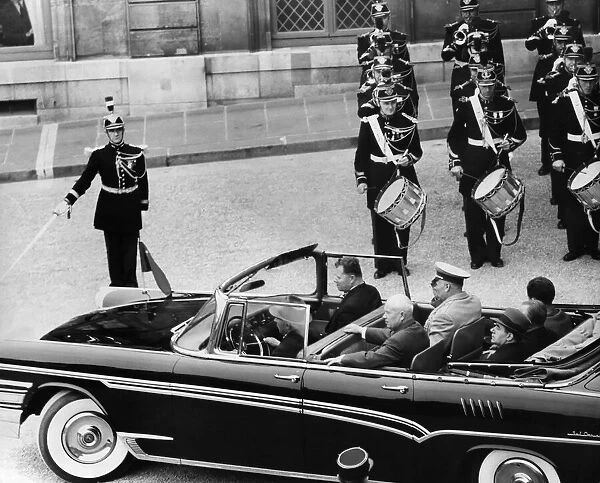 Soviet Premier Nikita Khrushchev accompanied by other Russian officials leaves the Elysee