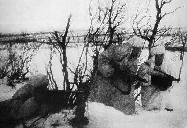 Soviet Red Army scouts of the Karelian Front wearing the white robes that make them