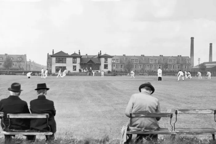 Framed Print : Spectators watching the action at Longsight Cricket Club in Manchester Framed Print : Spectators watching the action at Longsight Cricket Club in Manchester