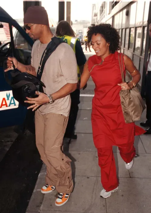 Framed Print : Spice Girl Mel B and husband Jimmy Gulzar Sep 1998 Newly weds leaving Heathrow for