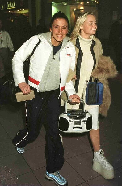 Spice Girls Emma Mel C leaving Heathrow for Madrid November 1997