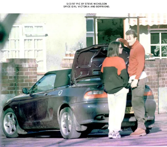 Framed Print : Spice Girls Victoria with boyfriend beside car