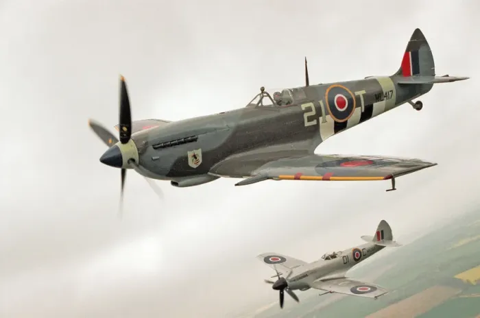 Framed Print : A Spitfire Mk IXe (ML417) flying in formation with a Mk XIV Spitfire of the Fighter Framed Print : A Spitfire Mk IXe (ML417) flying in formation with a Mk XIV Spitfire of the Fighter