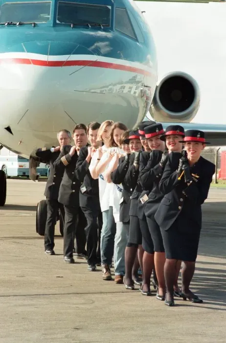Framed Print : Sponsored aircraft pull at Teesside Airport. British Midland staff are joined by Marie Framed Print : Sponsored aircraft pull at Teesside Airport. British Midland staff are joined by Marie