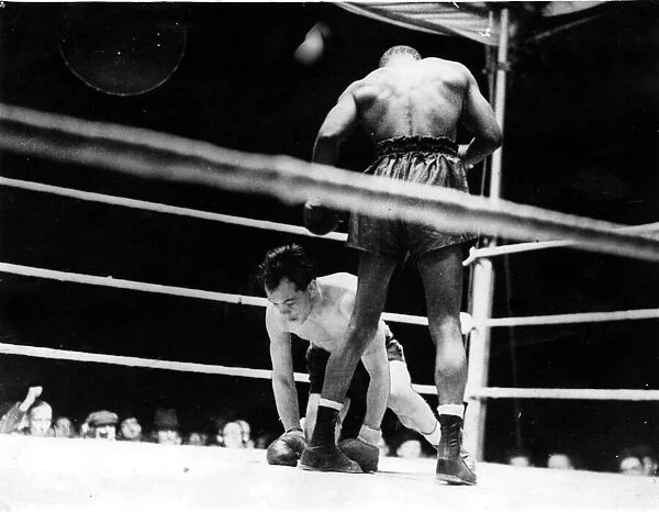 Sport - Boxing - Ronnie James taking one of his seven counts during his bout v Ike