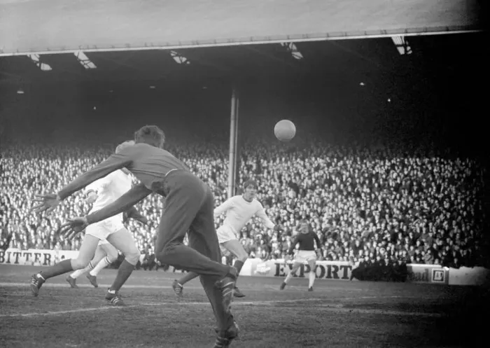 Framed Print : Sport. Football: Burnley v. Man United. Ure - Un. Centre half heads clear from a canasas Framed Print : Sport. Football: Burnley v. Man United. Ure - Un. Centre half heads clear from a canasas