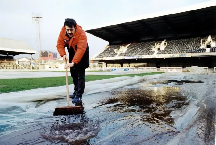 Framed Print : Sport - Football - Swansea City - Football ground stewards assistant Terry Fox helps